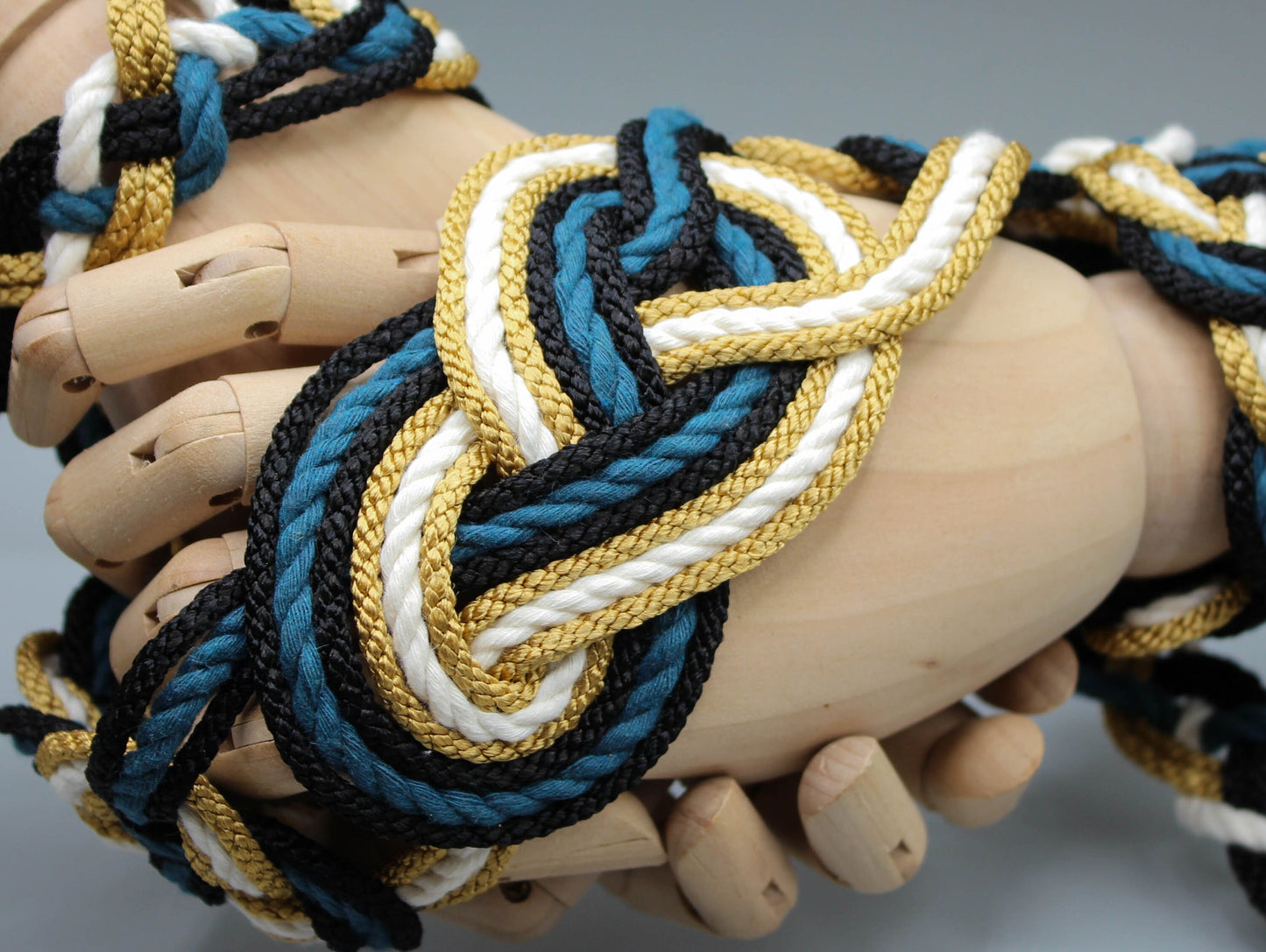 Nine Knot - Teal and Gold