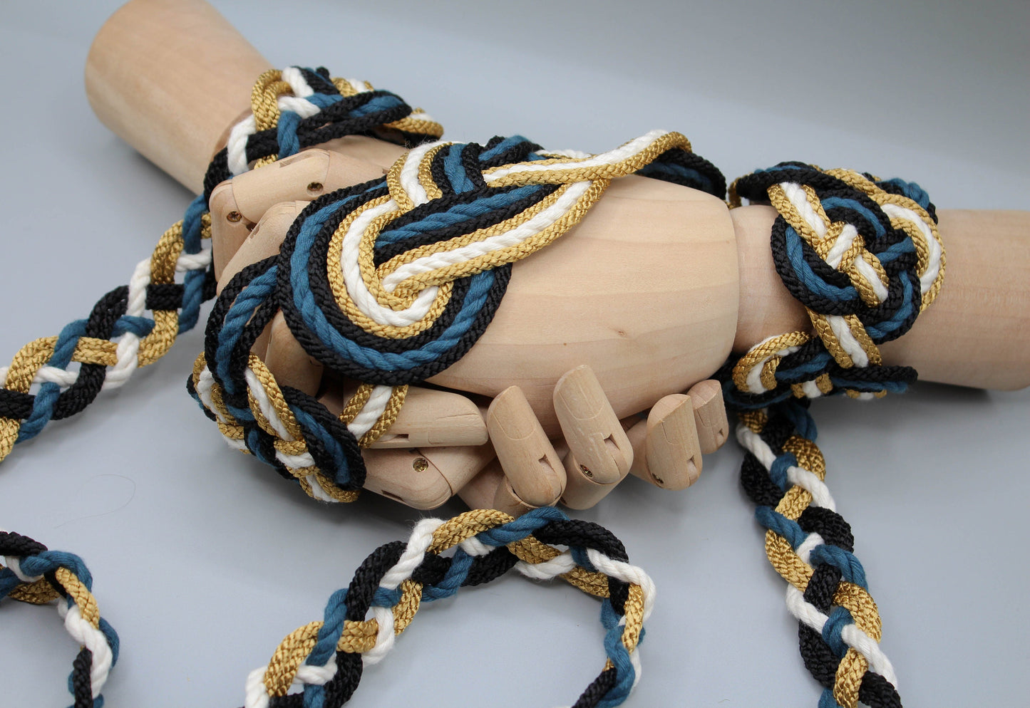 Nine Knot - Teal and Gold